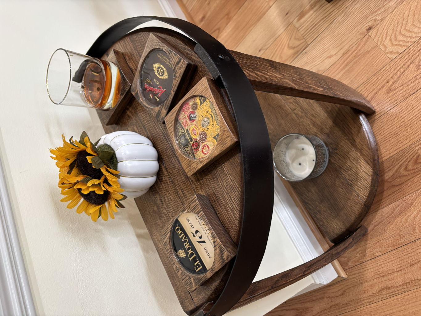 Barrel end table top with whiskey coaster inlays
