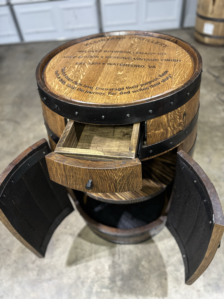 Whiskey barrel cabinet with engraved lid and internal storage