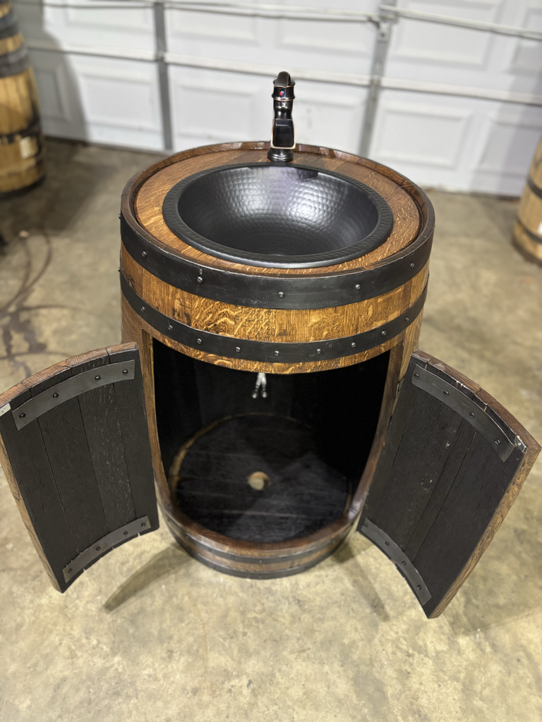 Whiskey barrel vanity sink with copper basin